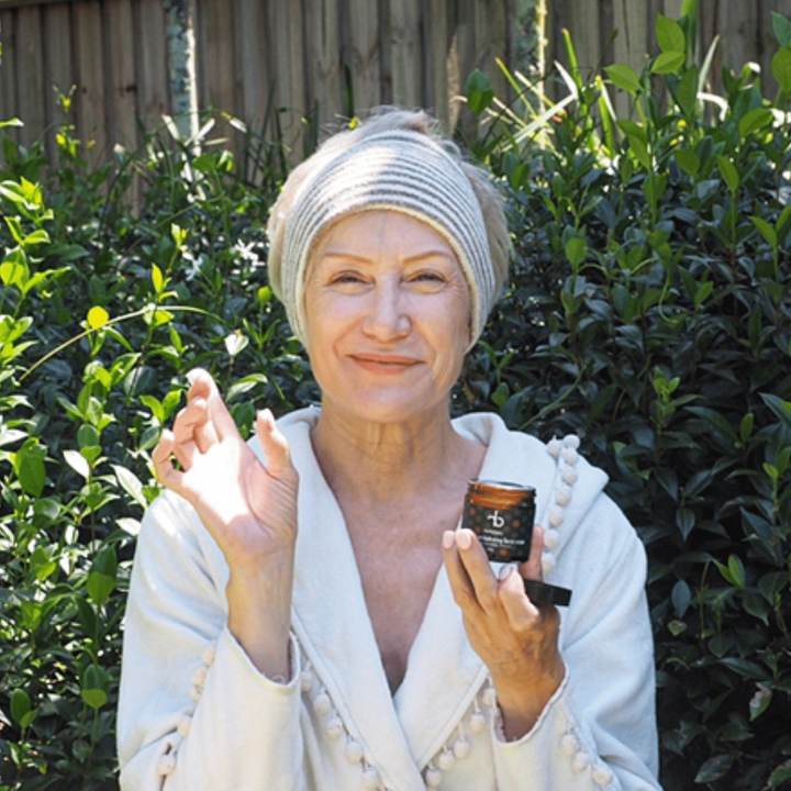 Happy Mature Customer Using Kakadu Plum Face Cream